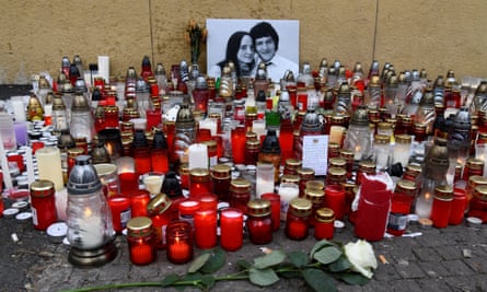 Candles and flowers left in tribute to murdered Slovak investigative reporter Jan Kuciak and his partner Martina Kušnírová