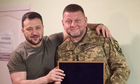Gen Valerii Zaluzhnyi pictured with President Volodymyr Zelenskiy at a meeting to discuss Russia's attack in Dnipro last July.