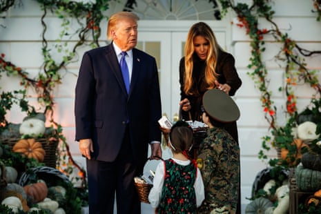 Donald Trump and Melania Trump greeted children dressed in Russian costumes during a Halloween event on the South Lawn of the White House on Thursday.