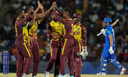 Akeal Hosein celebrates the dismissal of Afghanistan’s Rahmanullah Gurbaz