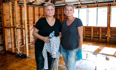 Luisa Duffy and Pierina Paron-Berry cleaning out the Me and My House childcare centre in Lismore