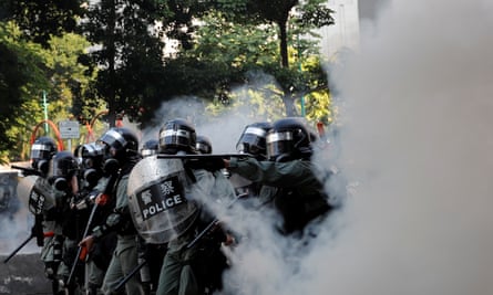 Police fire teargas canisters during a demonstration.
