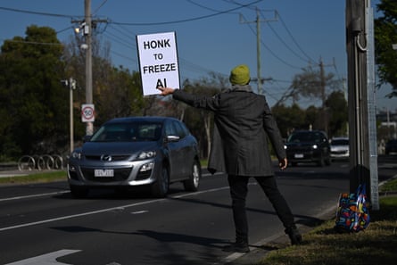 a man holding a sign