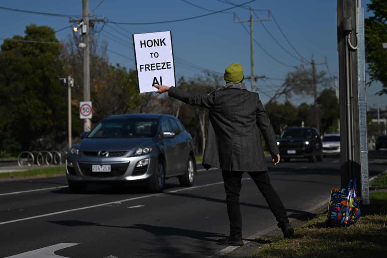 a man holding a sign