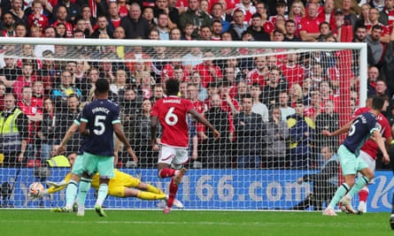 Brentford's Christian Norgaard (right) heads the opener against Forest