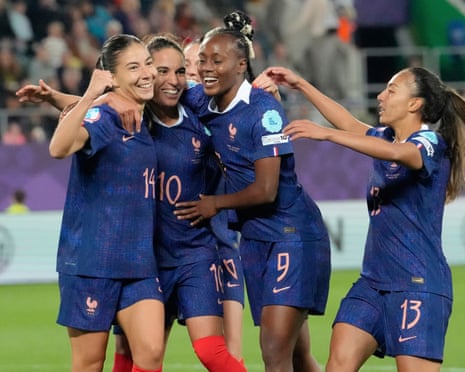 Amel Majri (second left) is congratulated by her teammates aft scoring France’s 3rd extremity against Wales.