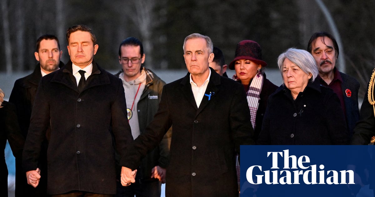 Mark Carney joins hands with Canada opposition leader as he pays tribute to school shooting victims