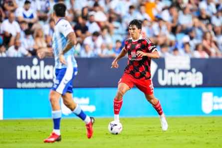 Gonzalo García surges forward during Fulham’s Costa del Sol Trophy match against Málaga.