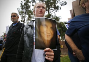 A photo of Heather Heyer is held during moment of silence.