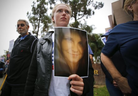 A photo of Heather Heyer is held during moment of silence.