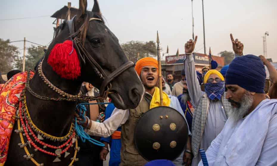A Nihang (Sikh warrior) at a protest against the newly passed farm bills, at the Singhu border near Delhi, India.