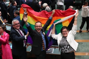 Cathy McGowan, Adam Bandt and Andrew Wilkie celebrate.