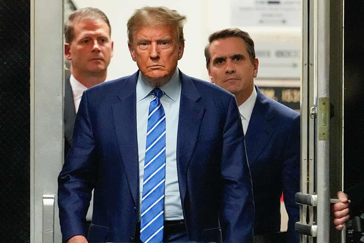 Former president Donald Trump returns to the courtroom after a recess at Manhattan criminal court, in New York on Tuesday.