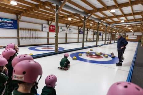 Bruce Kissel coaches Year 1 students from The Terrace School through curling for the first time at the indoor curling rink at Ice Inline. Bruce Kissel introduces over a 1000 local schoolchildren to curling each year in Alexandra, Central Otago.