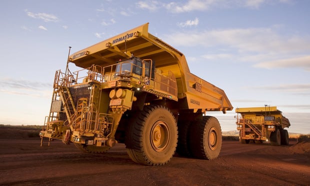 Autonomous haulage trucks operating at a mine in the Pilbara area of Western Australia. Photograph: Reuters Autonomous haulage trucks operating at a mine in the Pilbara area of Western Australia. Photograph: Reuters