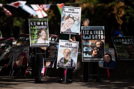 people holding signs