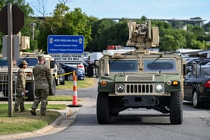 A Humvee vehicle leaves the Anacostia Park Police Field Office.