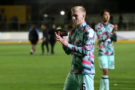 Ben Mee applauds the away fans at the end of Brentford’s game at Newport