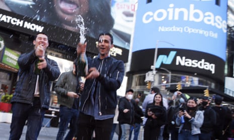Employees and supporters of Coinbase celebrate in New York City on 14 April. 