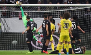 Eintracht Frankfurt’s goalkeeper Kevin Trapp is beaten by David Luiz’s free-kick but is saved by the crossbar.