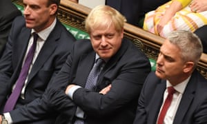 Britain’s Prime Minister Boris Johnson smiling in the House of Commons in London on October 19, 2019, during a debate on the Brexit deal.