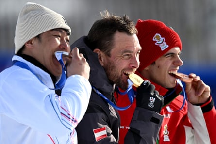 South Korea’s Kim Sang-kyum (left), Austria’s Benjamin Karl (centre) and Bulgaria’s Tervel Zamfirov savour their medals
