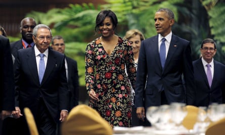Michelle and Barack Obama attend a state dinner hosted by Cuban president Raúl Castro.