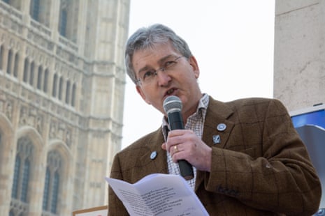Tom Langton speaks to protesters outside Westminster while a parliamentary debate on the controversial badger cull takes place inside the house of commons. 