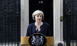 May outside No 10 on 13 July 13, her first day as PM.