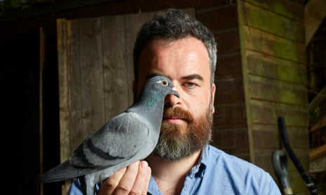 ‘I quickly came to love watching them fly’: Jon Day with Paul, one of his pigeons.