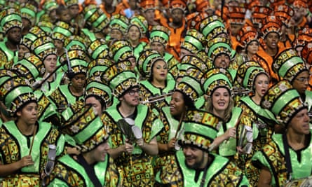 Members of the samba school perform during a parade of the carnival