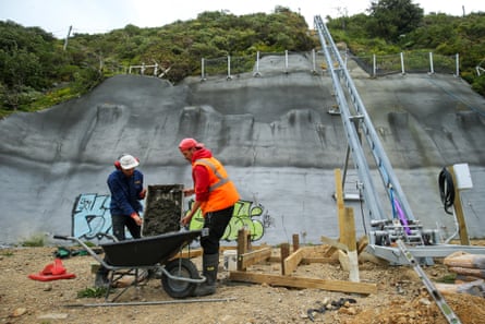 Builders work around a lift track in Roseneath, Wellington