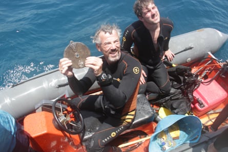 David Mearns, a professional shipwreck hunter, with an astrolabe found on the wreck of the Esmerelda off the coast of Oman