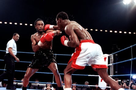 Nigel Benn and Chris Eubank Sr. fight in 1990.