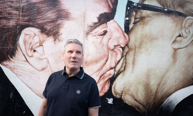 Keir Starmer walks past a section of the Berlin Wall known as the East Side Gallery on the second day of his two-day visit to the German capital.