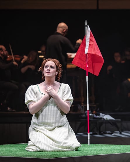 Kitty Whatley as Irene kneels by a golf flag.