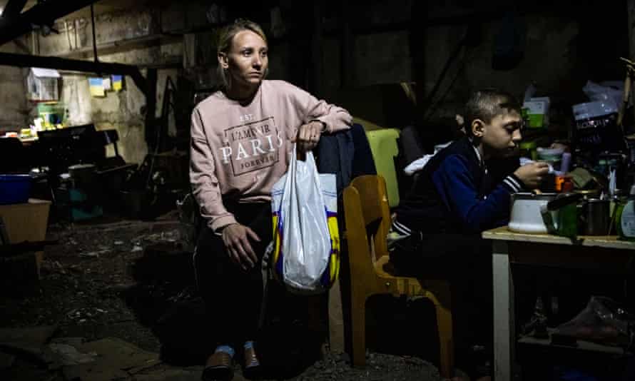 Timofey Seidov is eating with his aunt Yana Sotnikova in the basement of Kutuzovka.