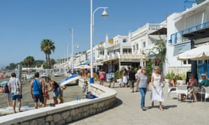 People at the promenade in Pedregalejo, Malaga, Andalusia, Spain.