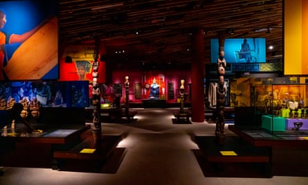 Yoruba objects on display in the dramatically lit exhibition space in the John Randle Centre