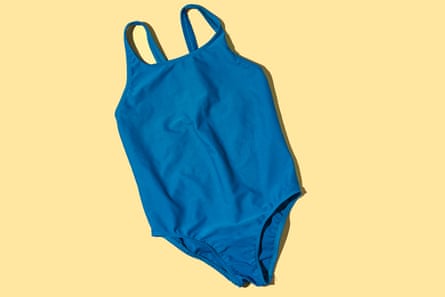 A blue one-piece swimsuit on a yellow background.