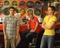 Four teenagers in a 70s-styled bar