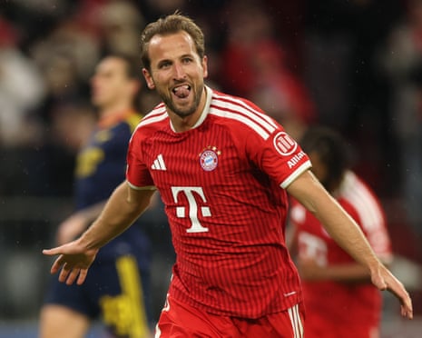 Harry Kane celebrates after scoring for Bayern Munich against Arsenal