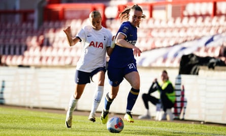 Niamh Charles in action against Tottenham Hotspur's Celin Bizet