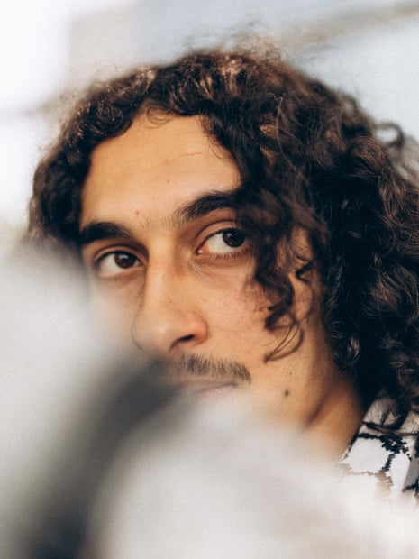 close up of a man’s face posing for a photograph