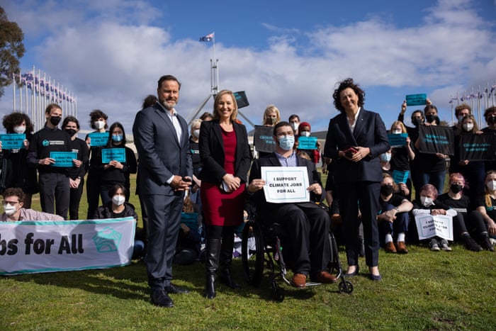 Greens members Peter Whish-Wilson, Larrisa Waters, Jordan Steele-John and Independent Dr Monique Ryan stand with Tomorrow Movement protesters.