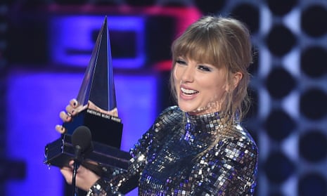 Taylor Swift accepting one of her four American Music Awards.