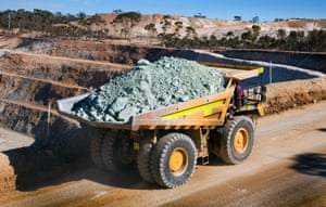 A truck carries nickel ore out of Western Areas NL’s Tim King Pit open-cut nickel mine at Spotted Quoll, in Forrestania, Western Australia.