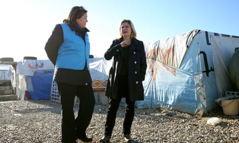 Justine Greening (right) during a visit to an informal tented settlement occupied by Syrian refuges close to the Syrian border in Lebanon last week.