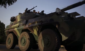 A convoy of Senegalese soldiers approach the Gambia border.