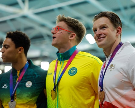 Adam Ramsay-Peaty at the medal ceremony after getting bronze in the men’s 50m breaststroke.